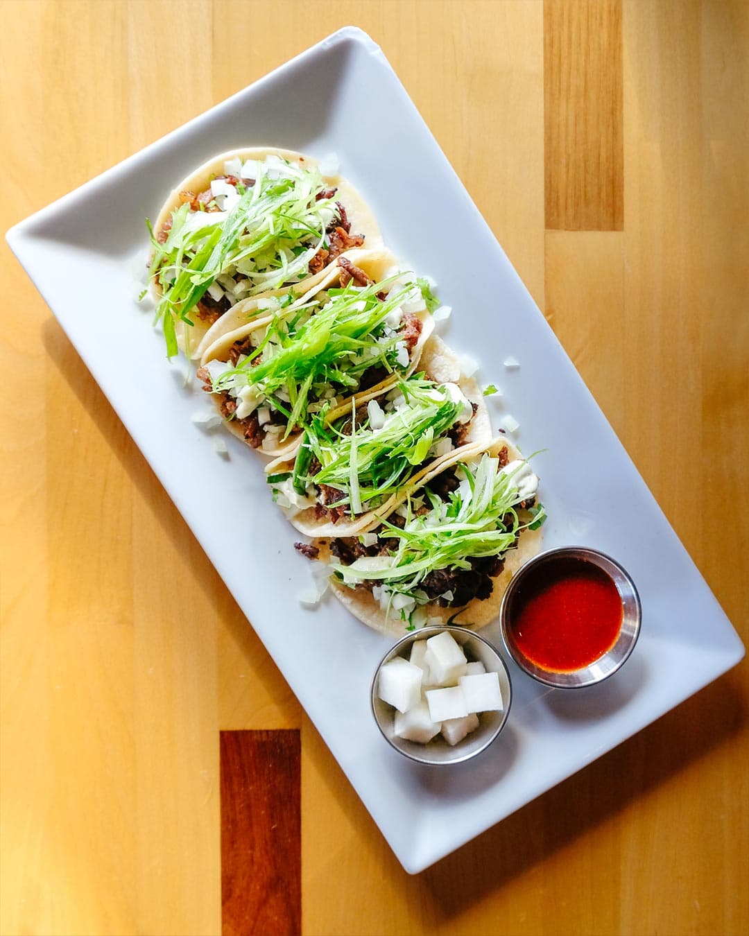 Gourmet plated fusion Korean Taco showcasing modern presentation of traditional flavors